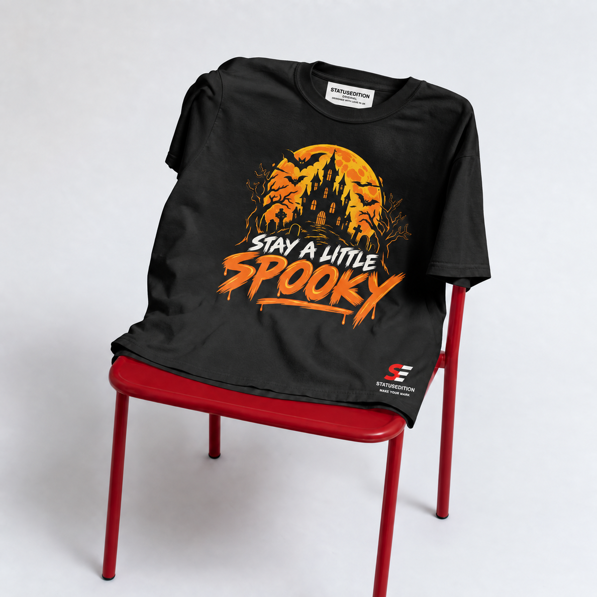 Stay A Little Spooky Tee — Black — front