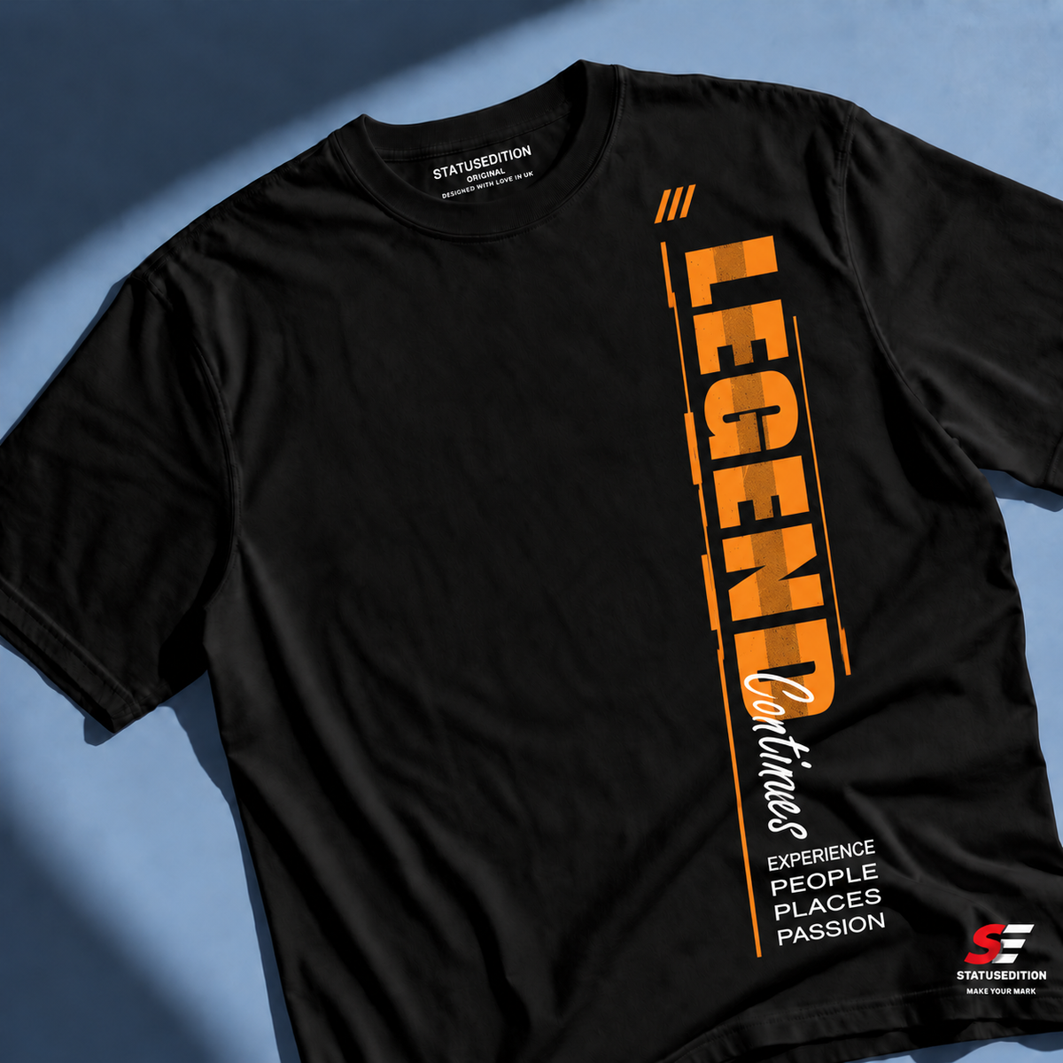Legend Continues Vertical Tee — Black, front view 1